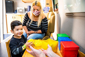 Pediatric Mobile Services child playing with blocks