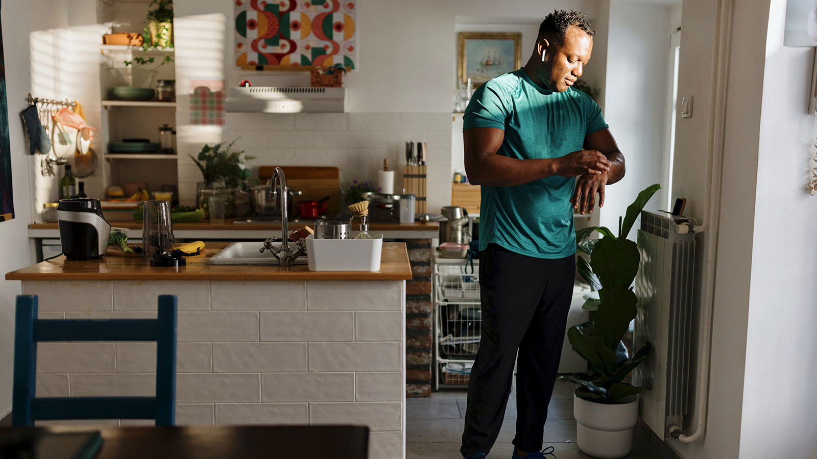 guy checking his watch for health metrics