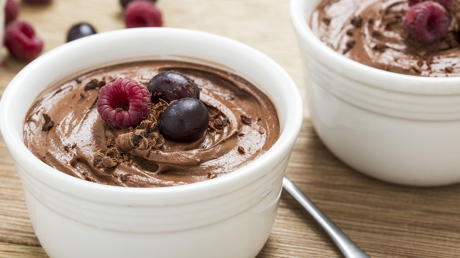 Chocolate pudding topped with berries