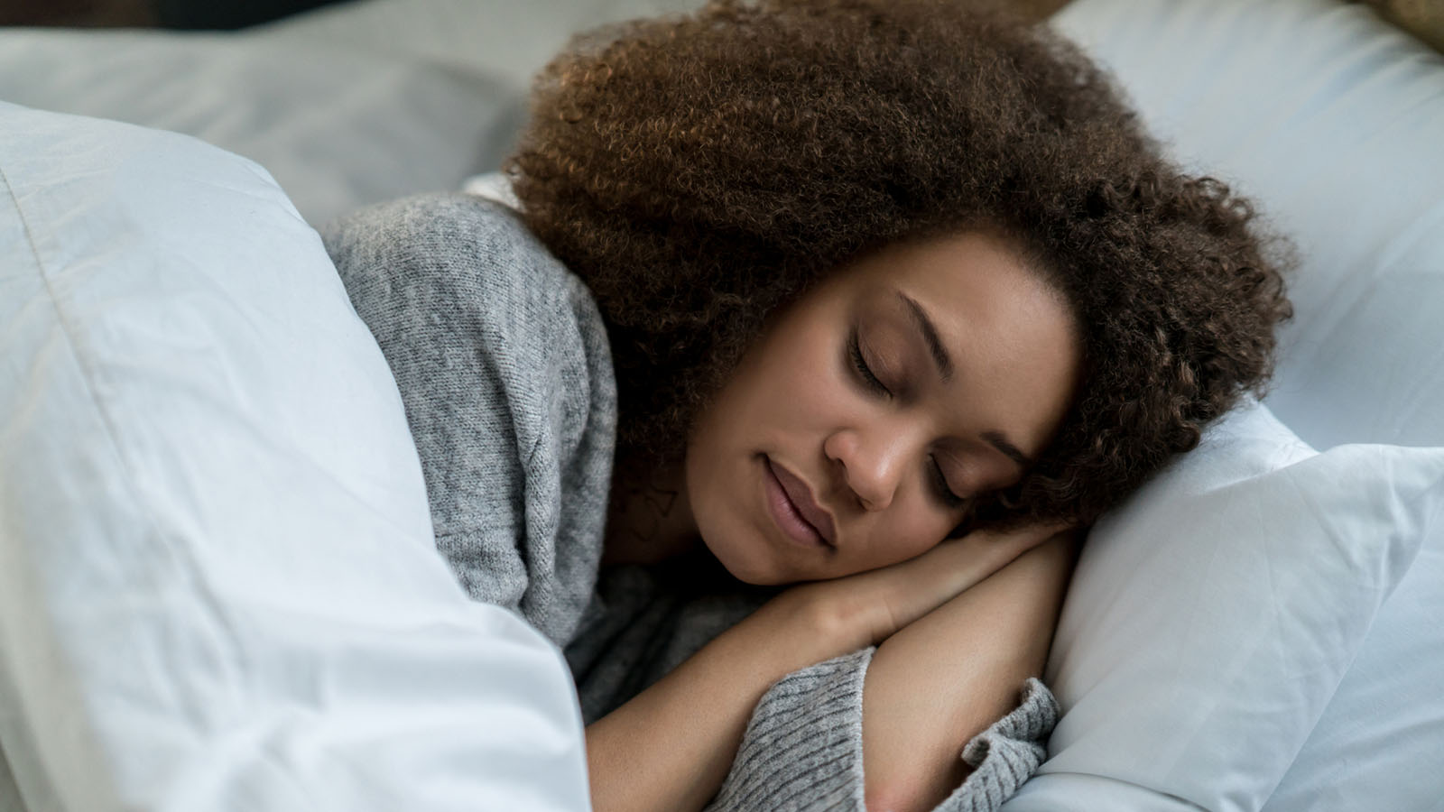 young adult female sleeping soundly