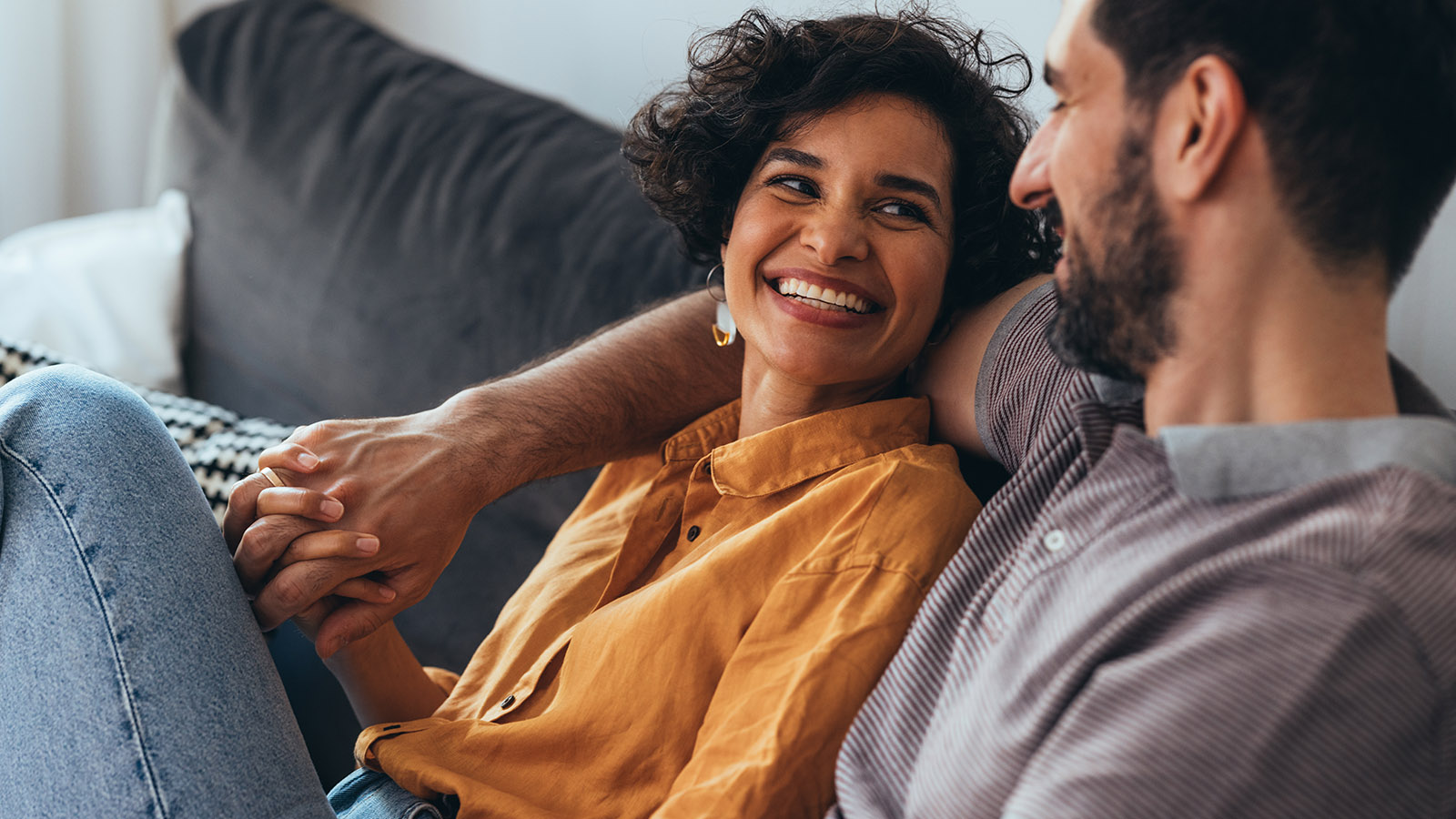 Young couple enjoying time together on the couch