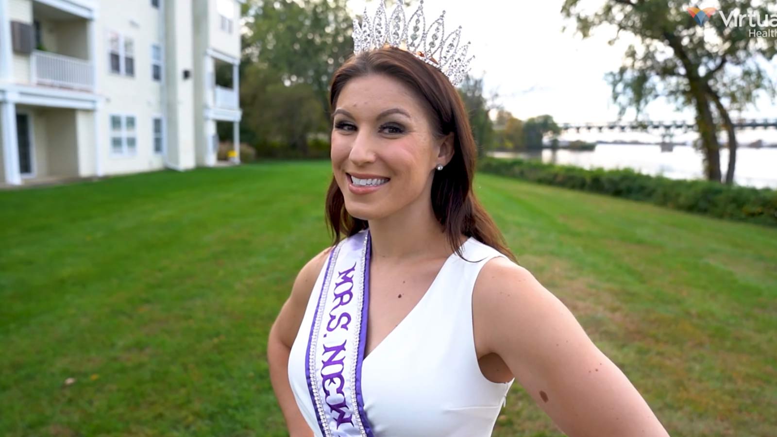 woman smiling at the camera while wearing a tiara and Miss New Jersey sash