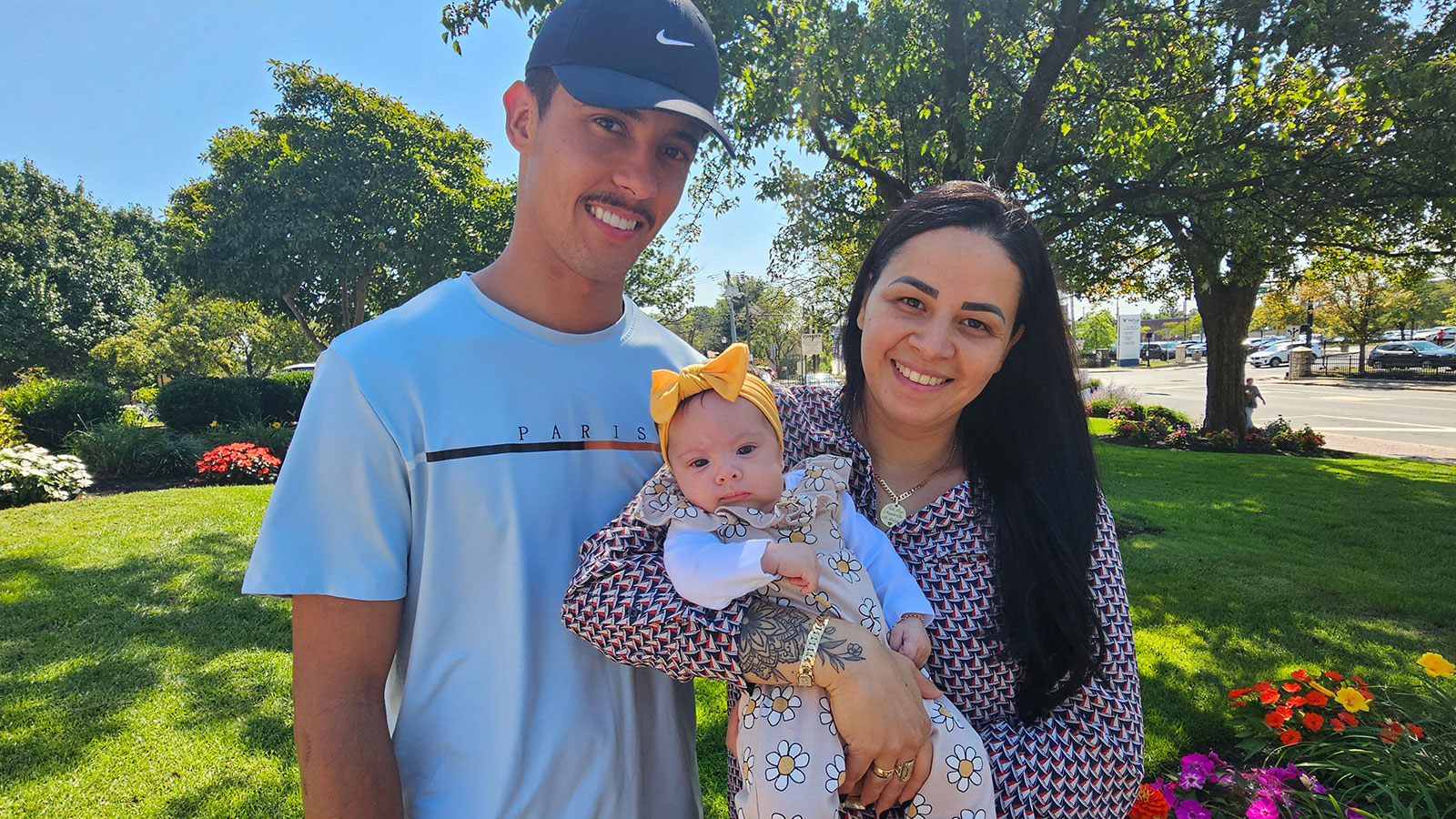 Virtua patient with her husband and infant daughter after receiving care for a high-risk pregnancy