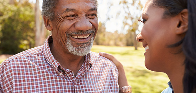 Two people smiling at each other