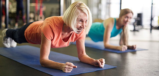Two people doing yoga poses