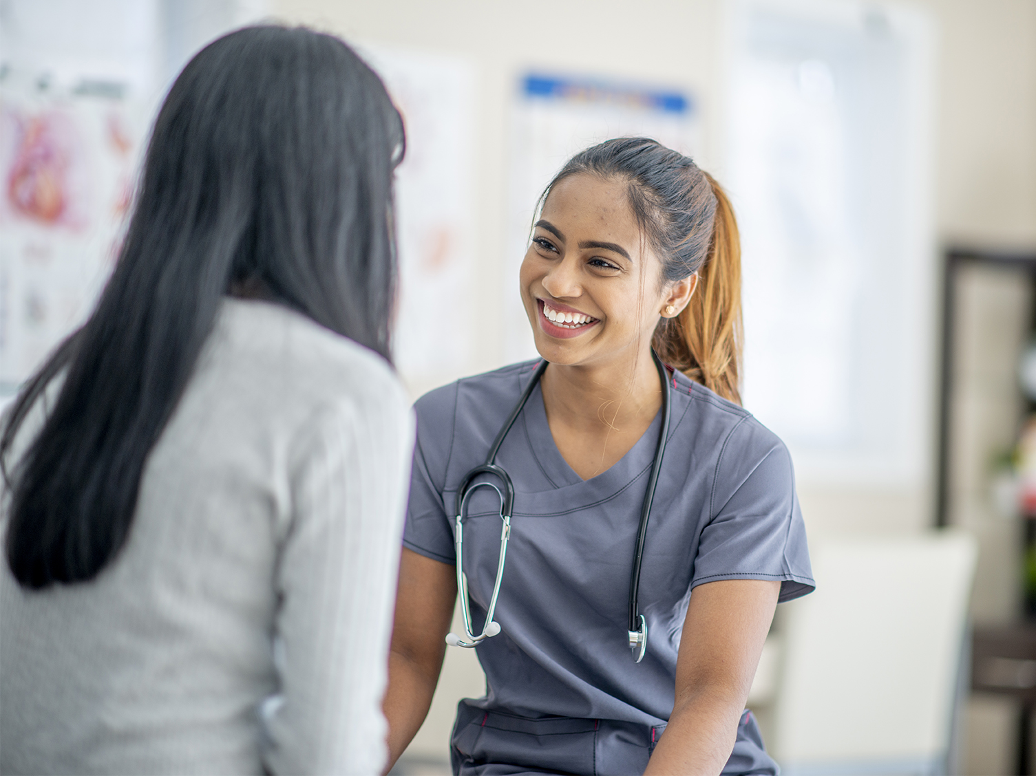 Medical Resident talking to a patient