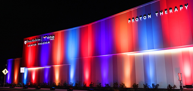 Penn | Virtua Health Proton Therapy Center lit up for preview celebration
