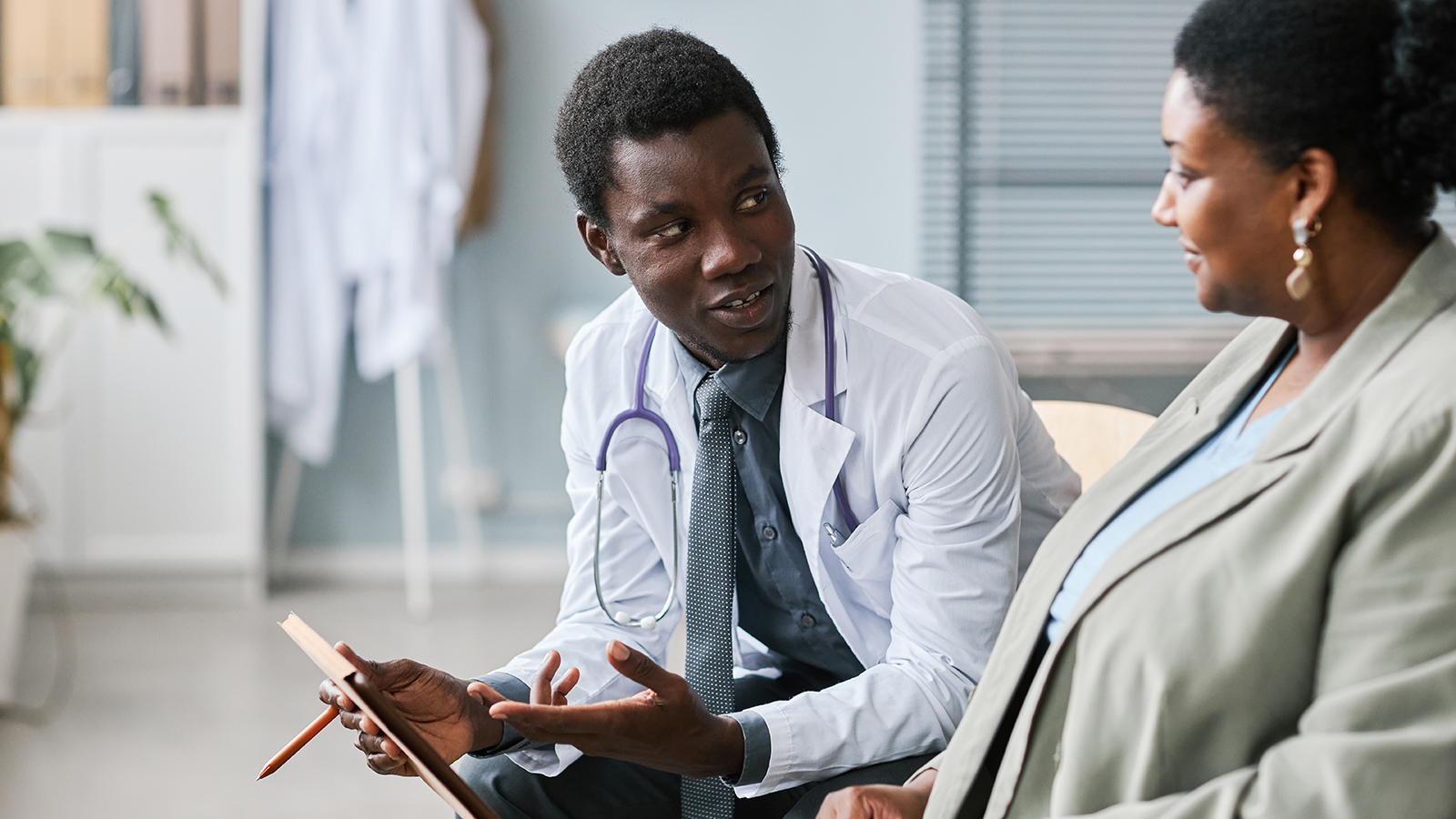 A doctor and patient talking