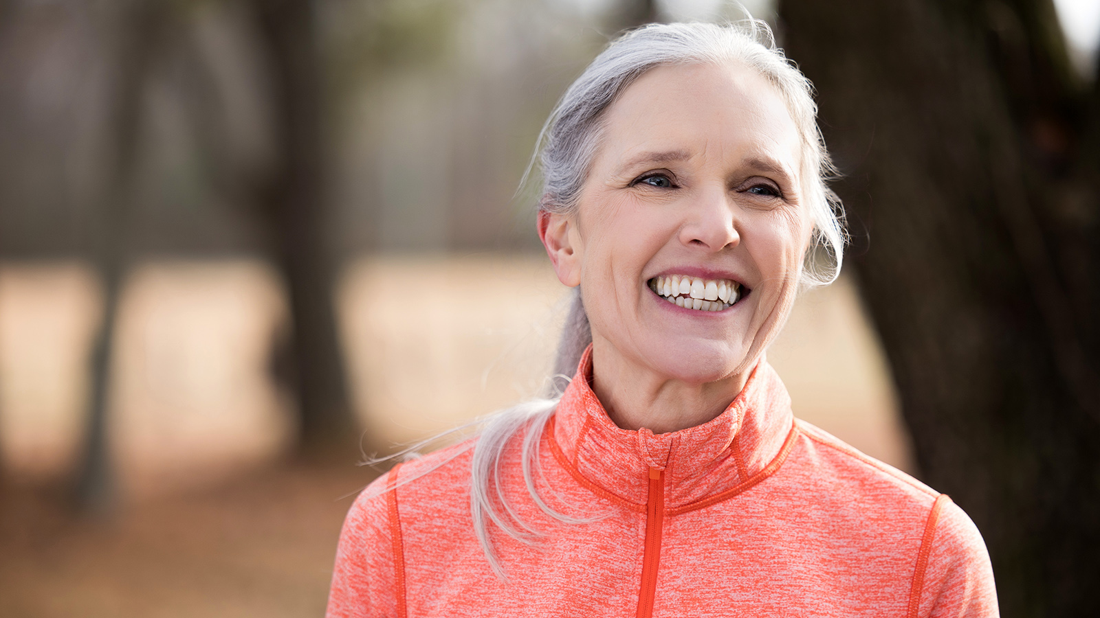 Older woman walking in park