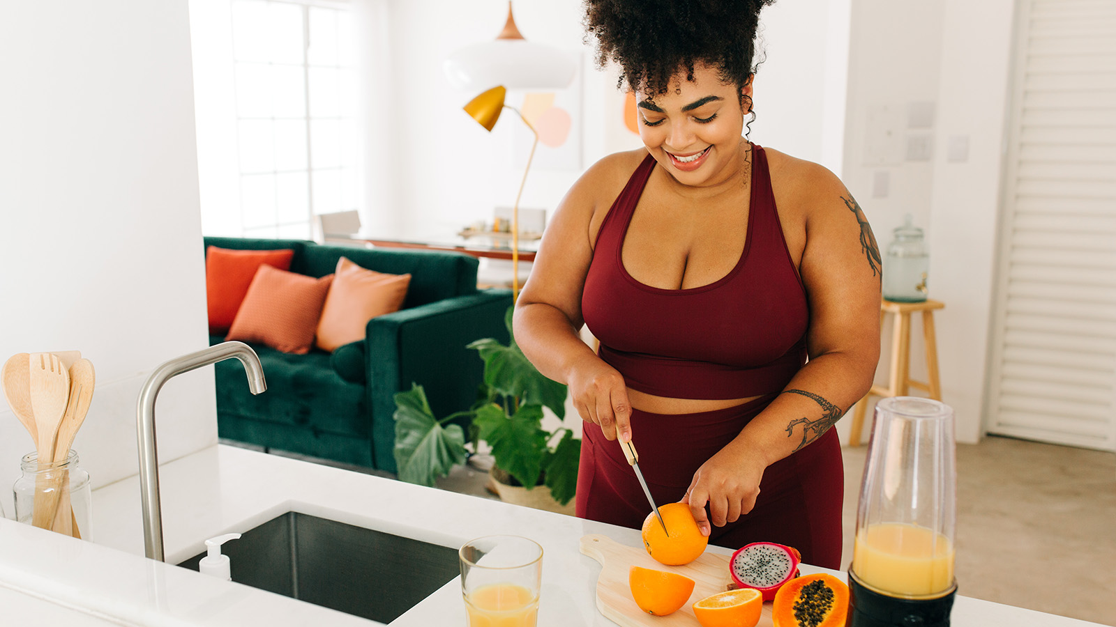 Women cutting oranges